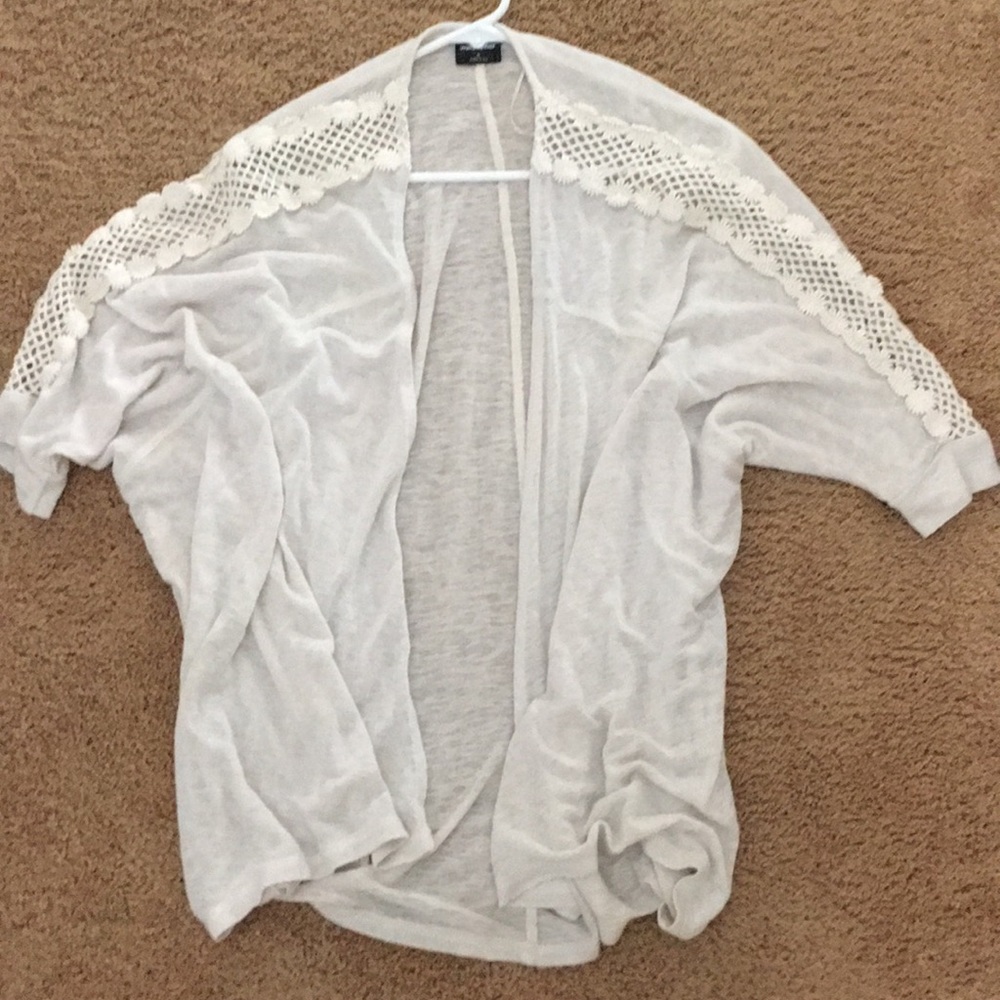 cream colored cardigan